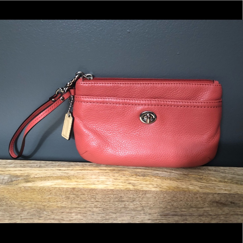 Coral coach wristlet